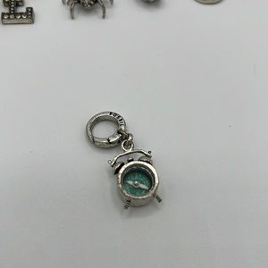 Fossil clock bracelet charm